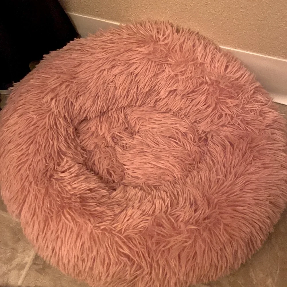 Pink dog/cat bed. Smaller breed.