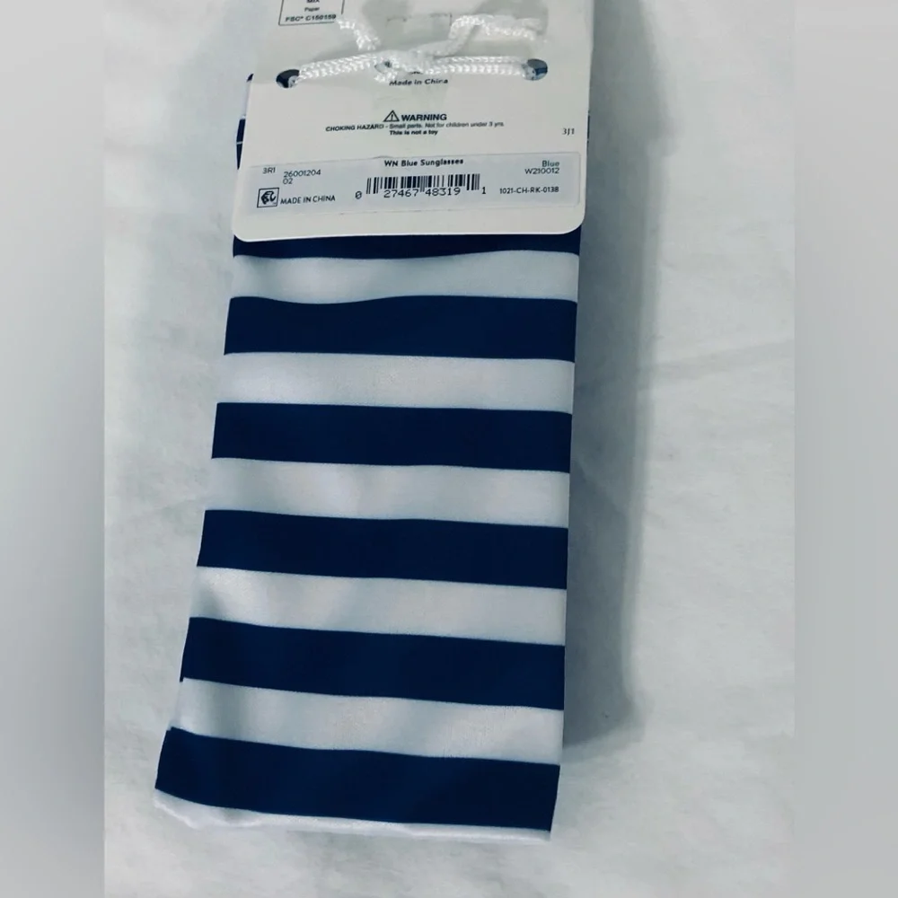 Kind’s sunglasses and pouch blue stripes.
