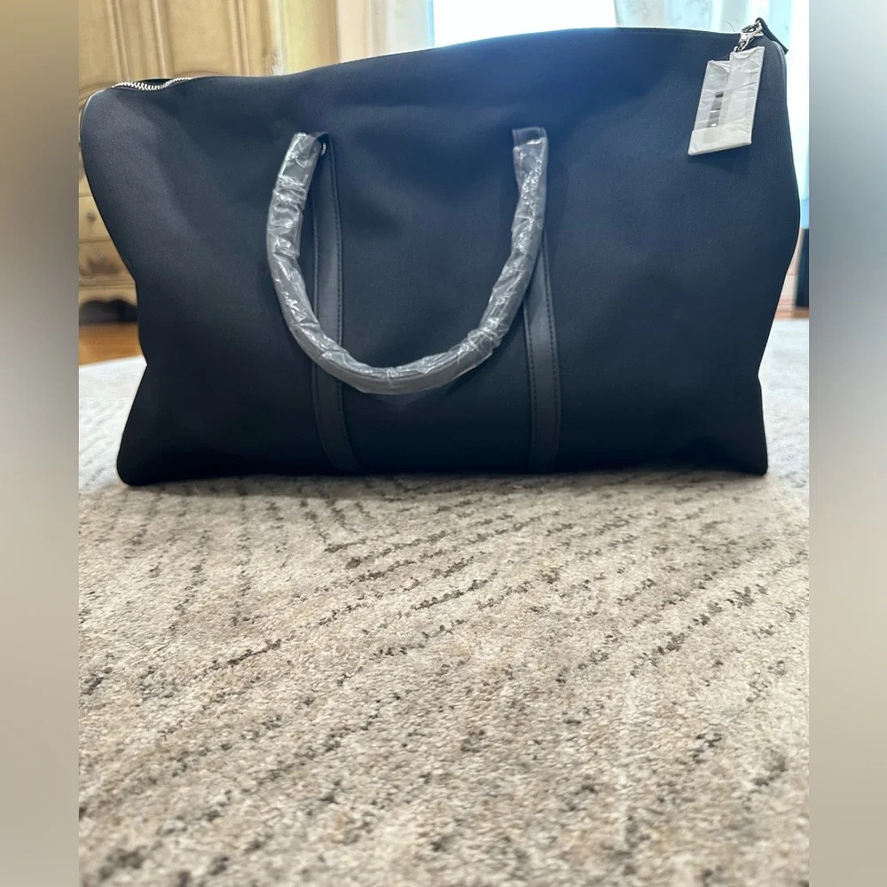 Paco rabanne 1 million black duffel bag. NWT.