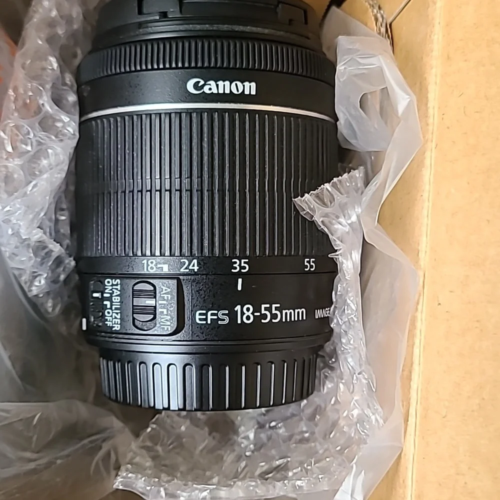 Canon EOS Rebel SL1 Digital SLR with 18-55mm STM Lens