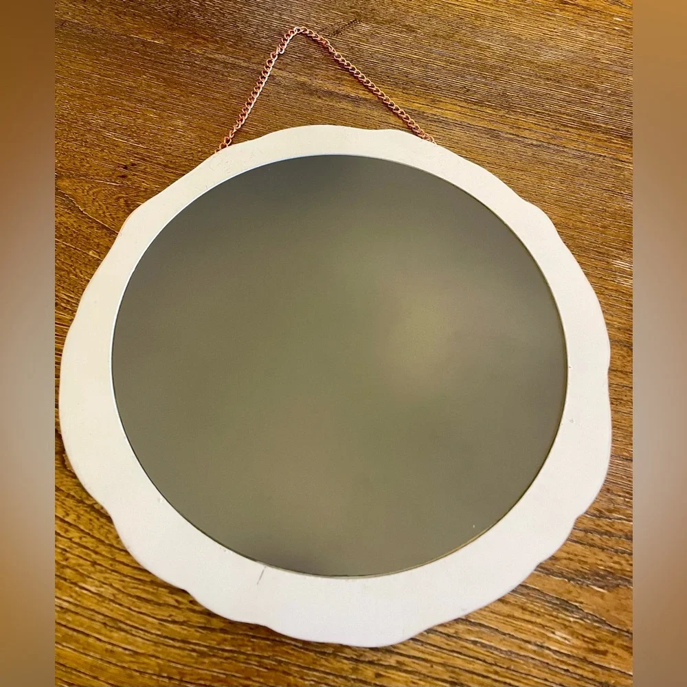 Source Unknown round mirror