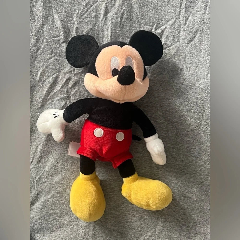 Small Mickey Mouse stuff animal with little bean bag in butt