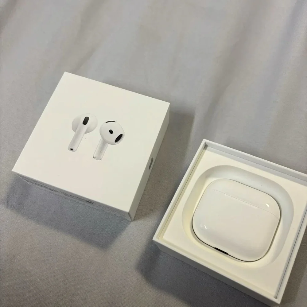 Apple Smartphone with Black Frame and Colorful Display +airpods generation 4 Pro
