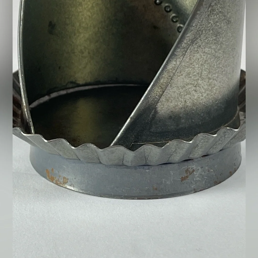 Vintage punched tin tea light candle holder