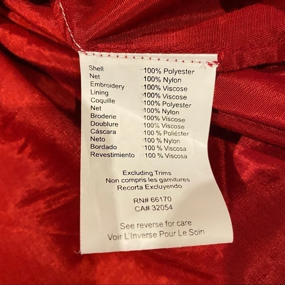 Niki Tlahajan red hemline size