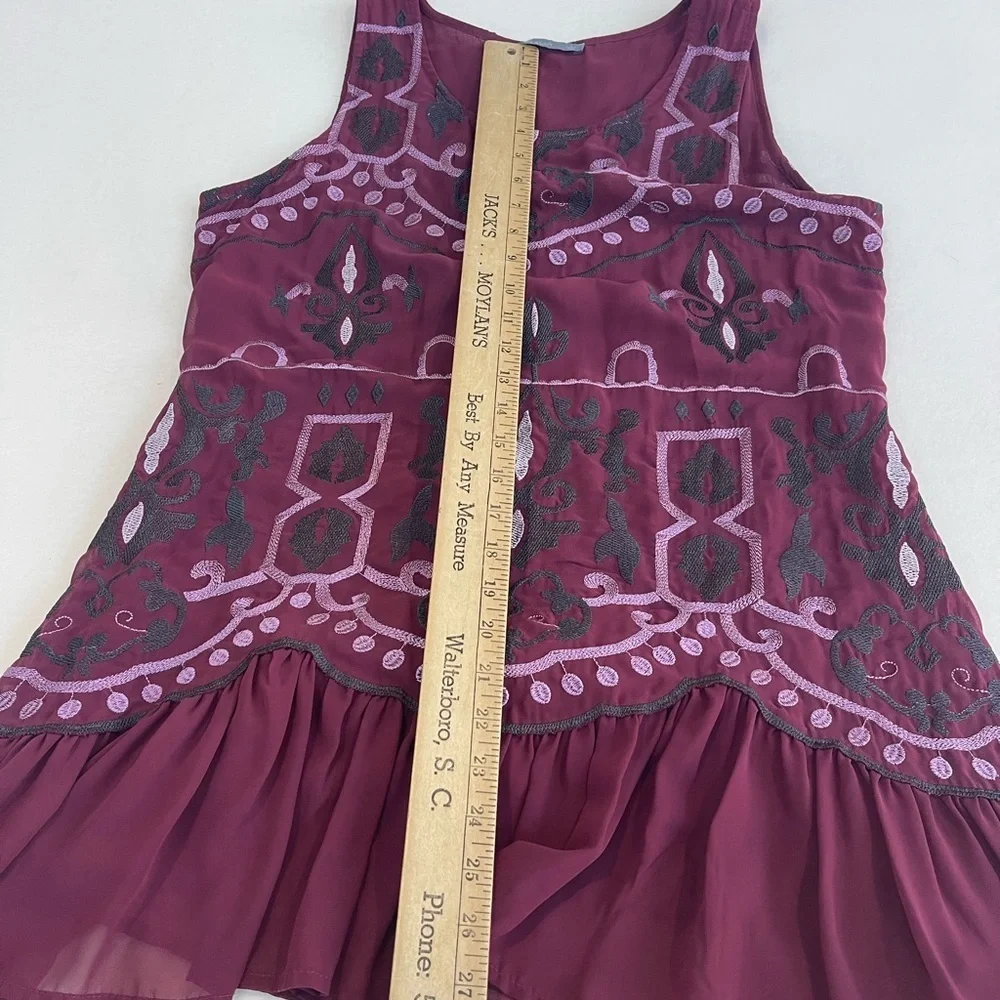 Octavia sleeveless embroidered tunic top. Fully lined. In new like condition.LG