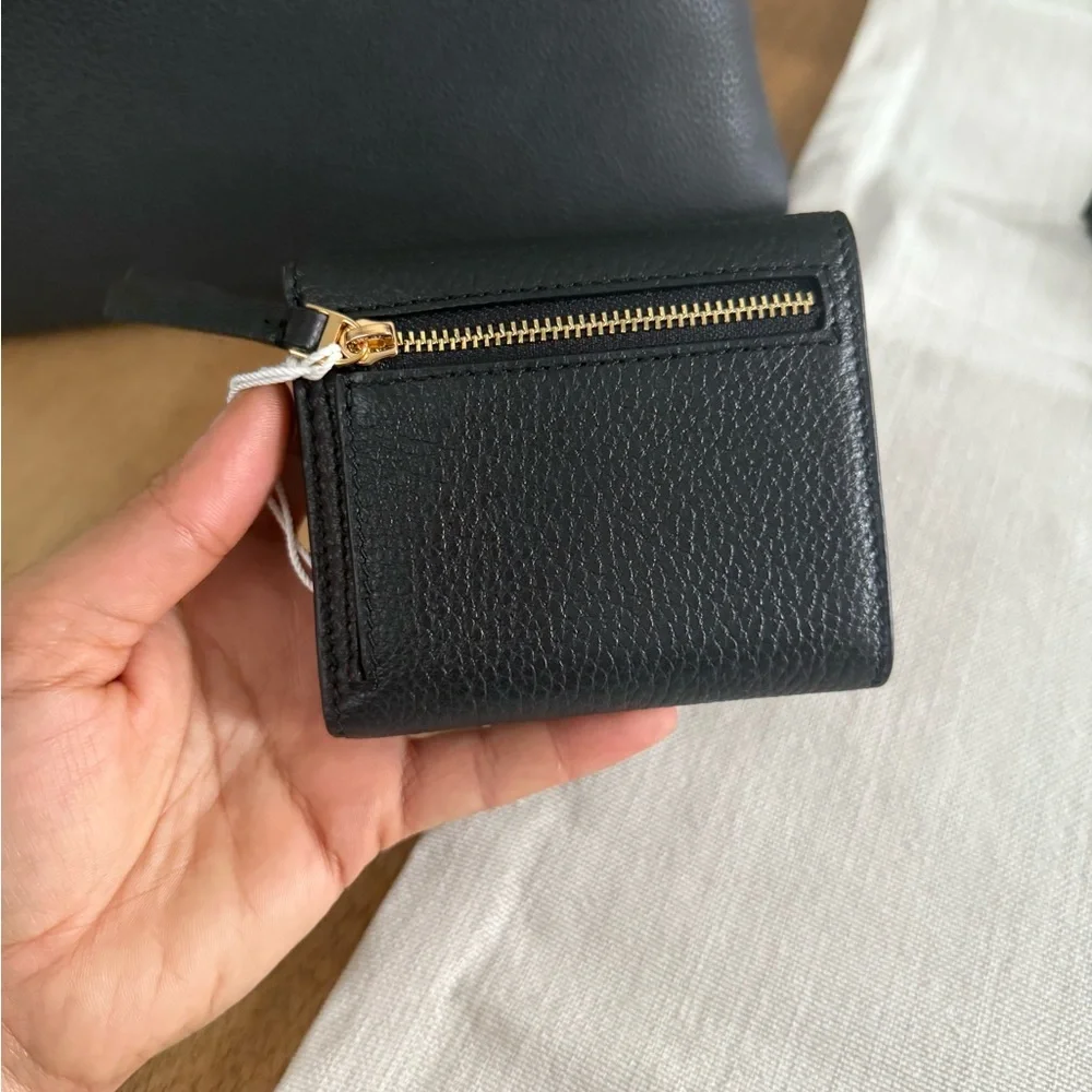 Tory Burch interior handle compartments