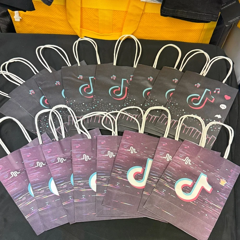 16 count pack of Themed Party Favor Bags - Black and Purple