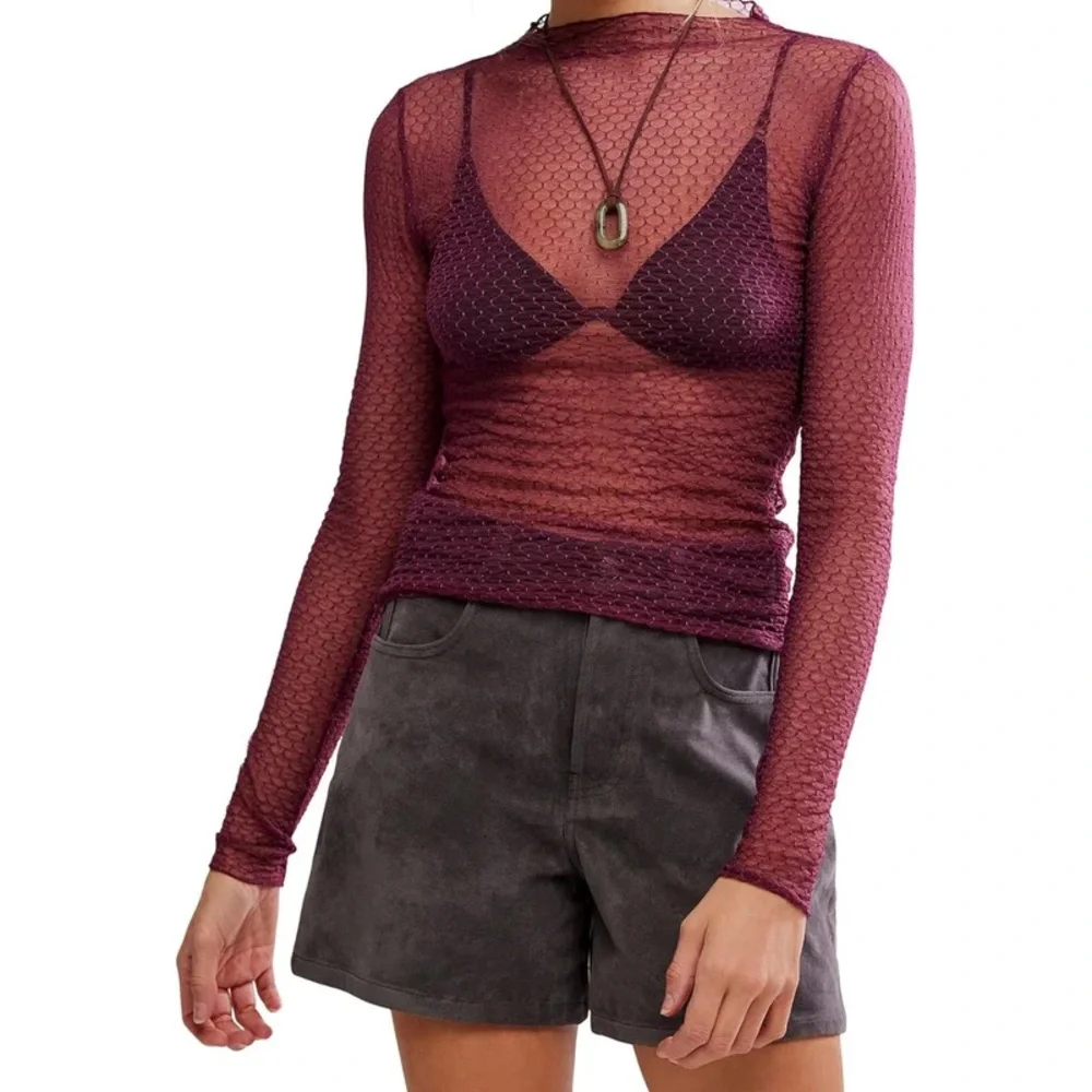 NWOT Free People minding my business top NWOT plum, black and pink available