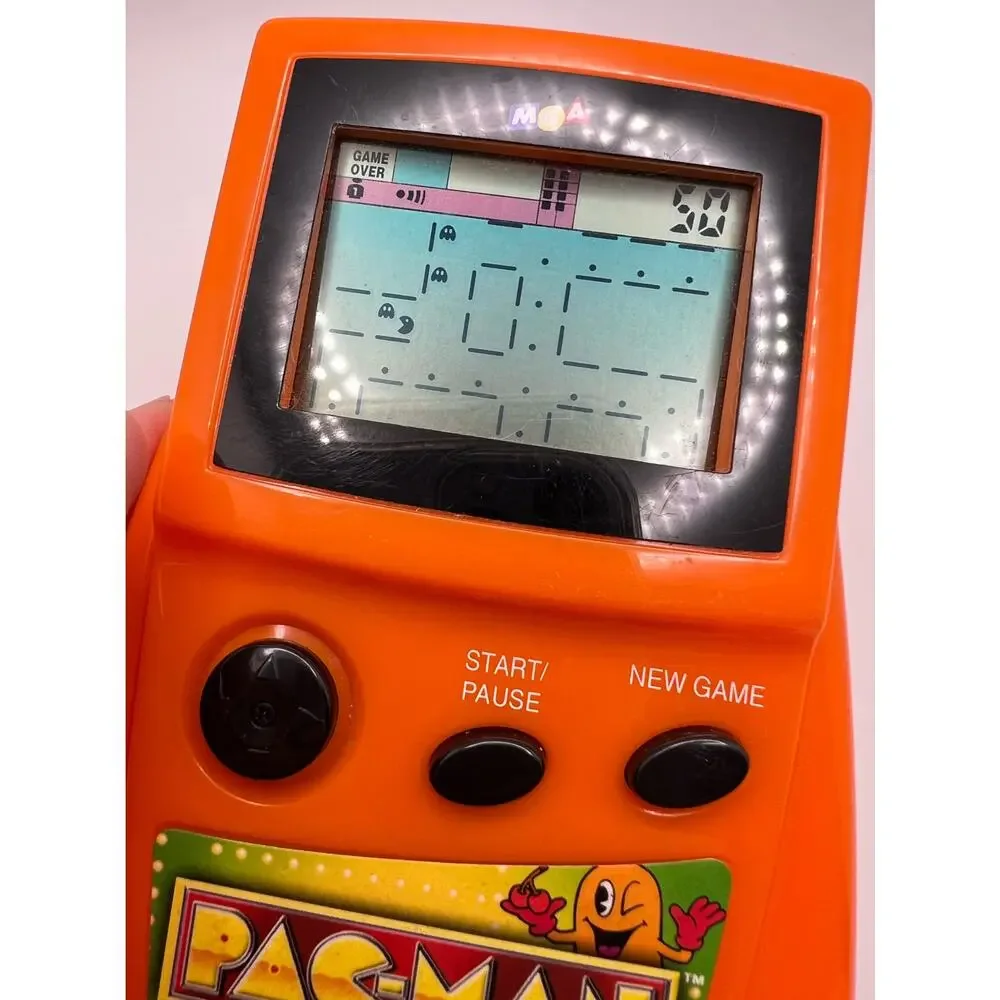 PacMan handheld electronic game by MGA from Radioshack