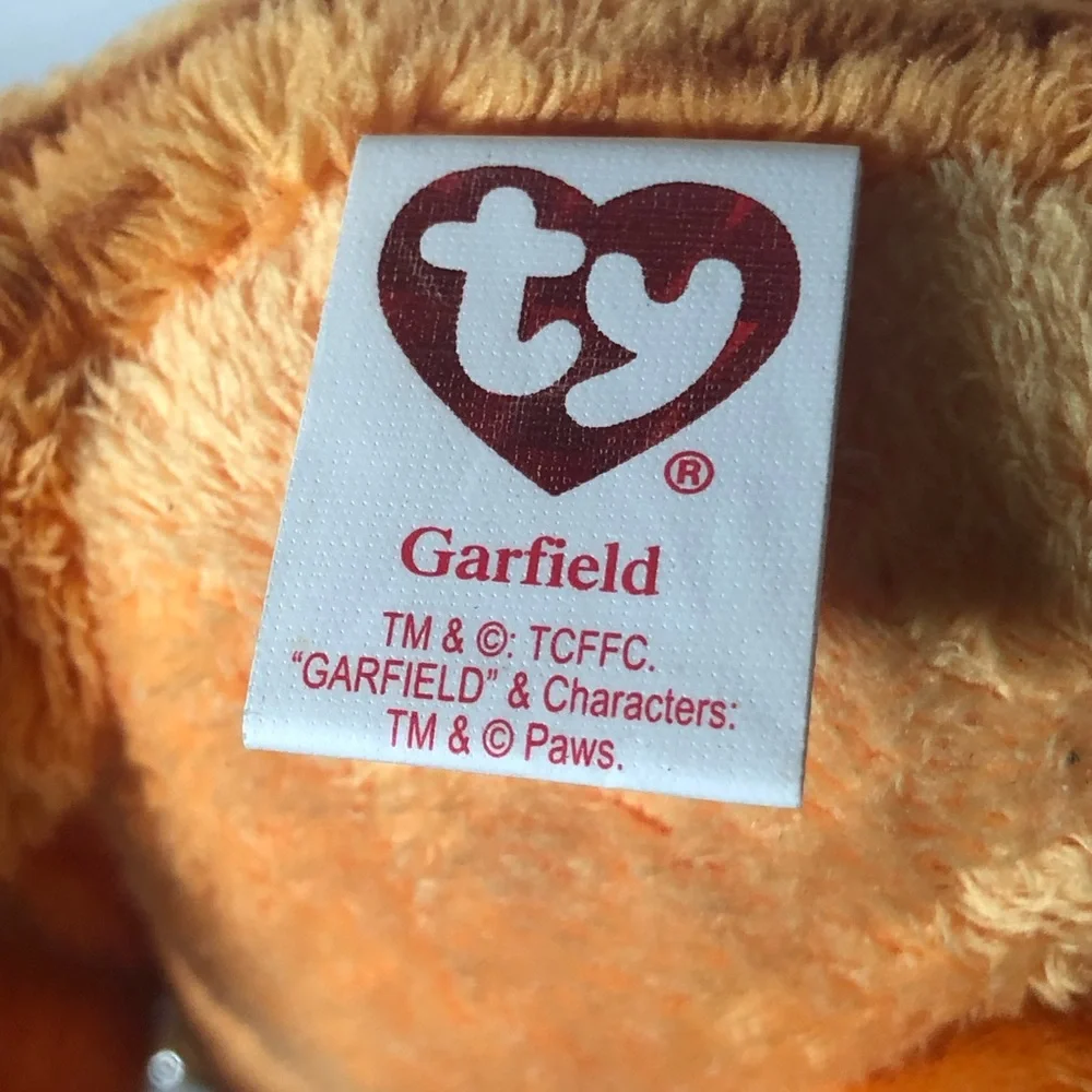 TY Beanie Babies Garfield stuffed animal plush with original tag.