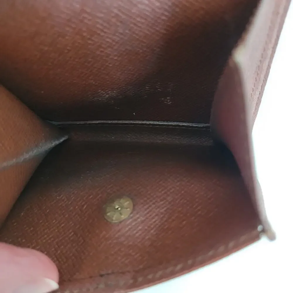 Louis Vuitton compartments interior otherwise