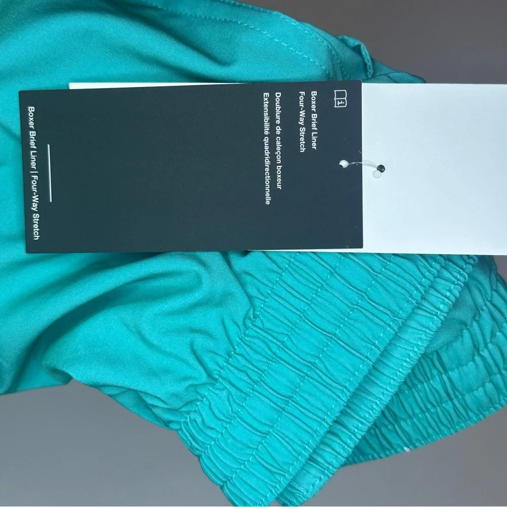 Nike Turquoise and Neon Green Swim Shorts