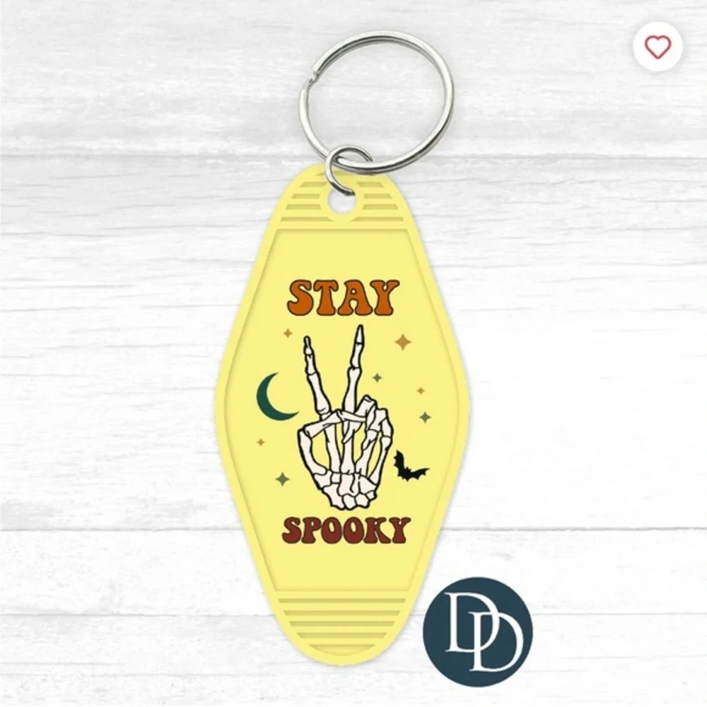 Stay spooky yellow motel‎ keychain