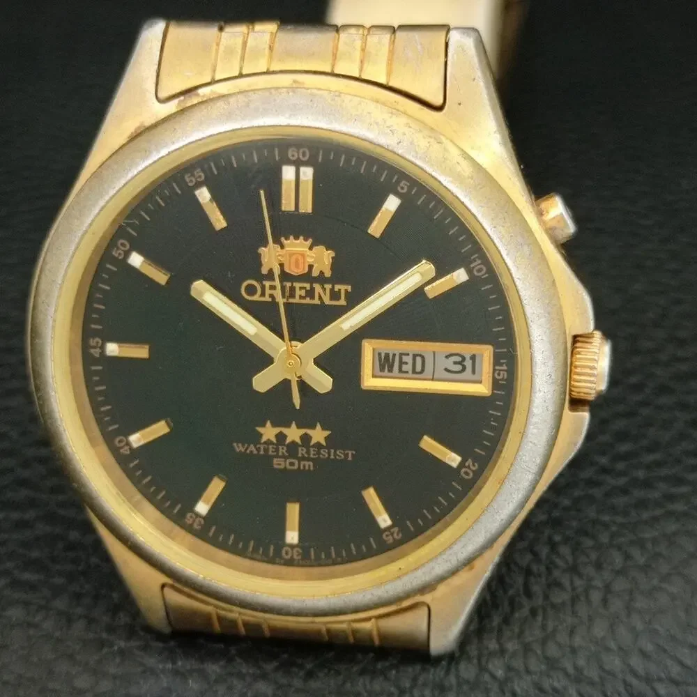 Vintage 1972 Orient Automatic Mens Gold Watch W/daydate & Black accents