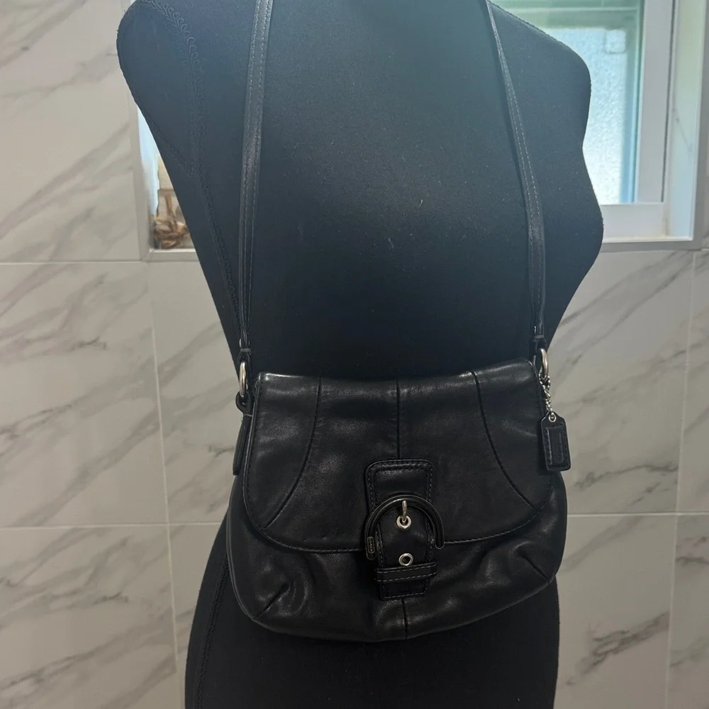 Coach sleek black