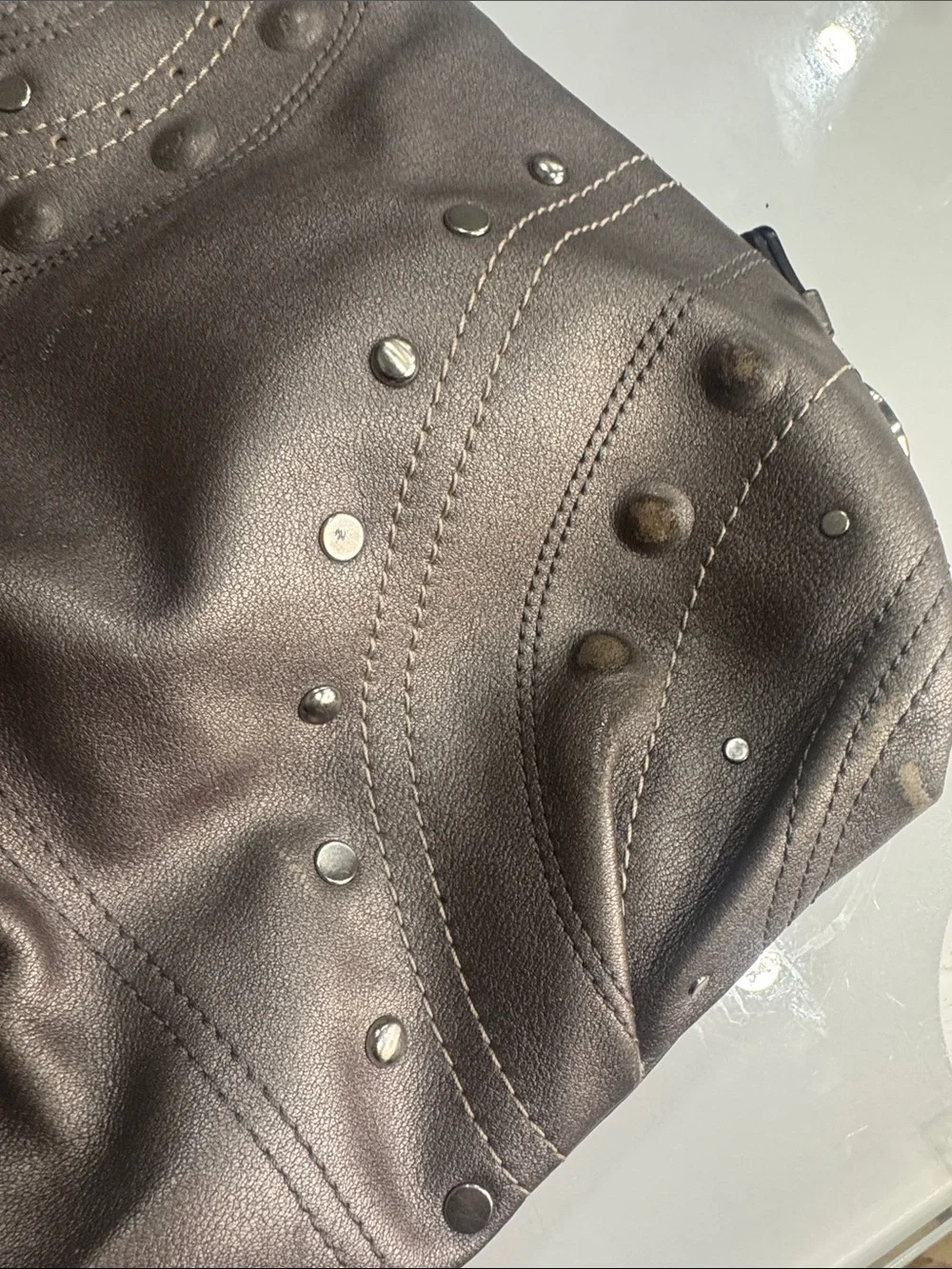 Coach Y2K Madison hobo bag featuring metallic pewter leather and silver studded