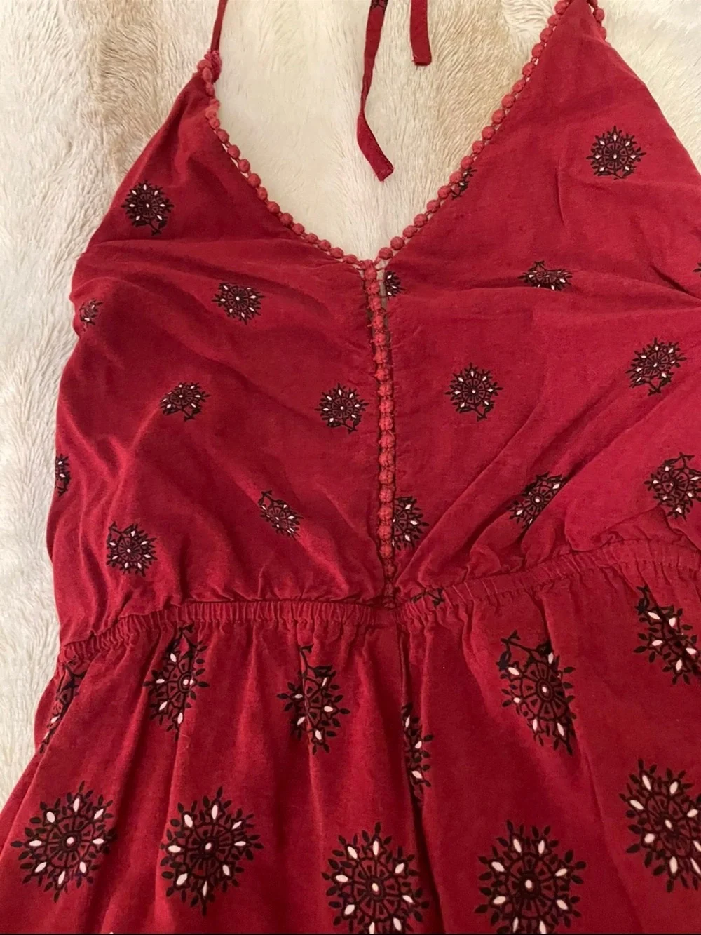 Size Medium Women’s Burgundy Printed Romper with V-Neck
