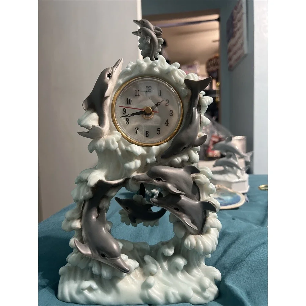 Source Unknown dolphin clock