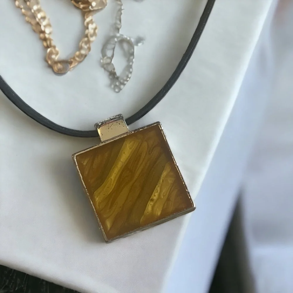 Kenneth Cole New York amber silver