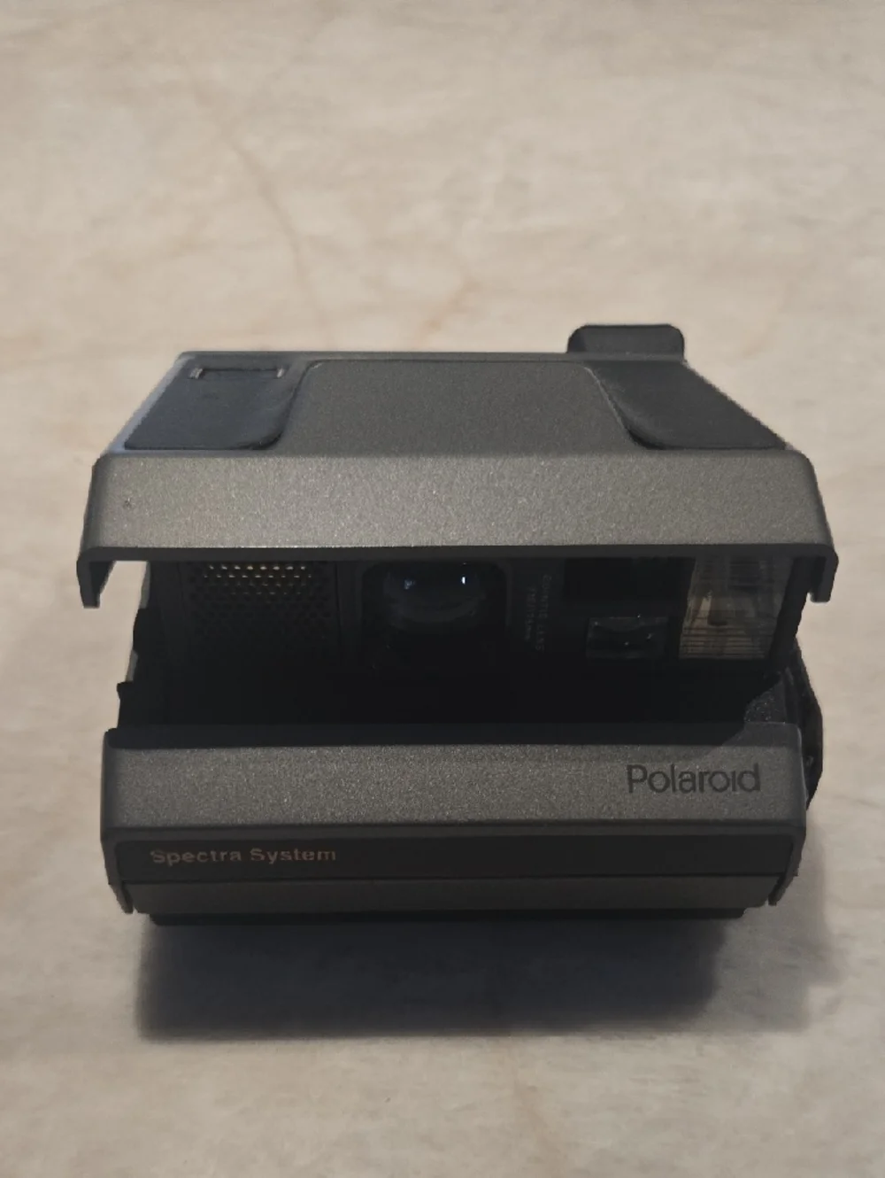 Polaroid spectra system