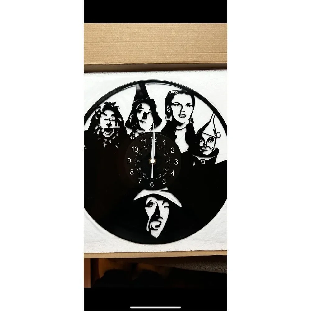 The Wizard of Oz 12”Black Lp wall clock . Battery operated .
