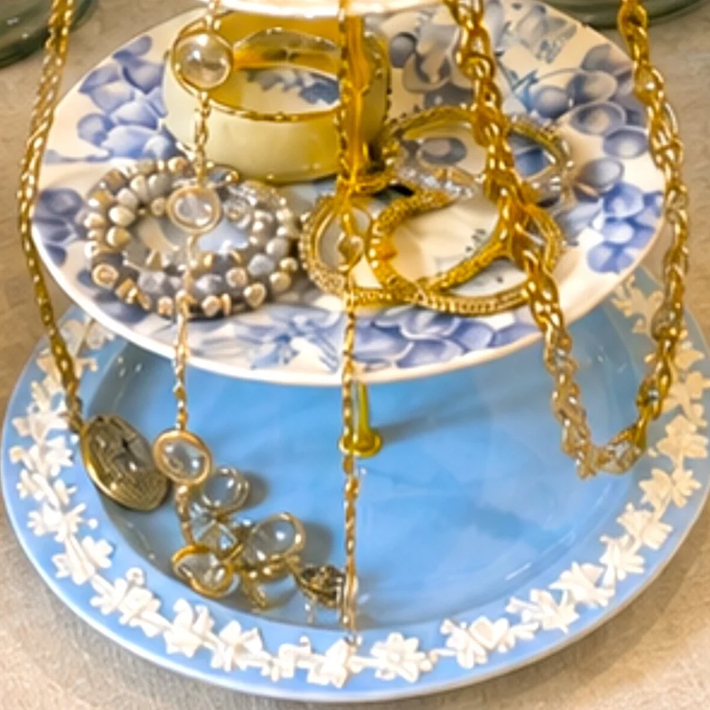 Handmade jewelry display or dessert display made out of vintage plates
