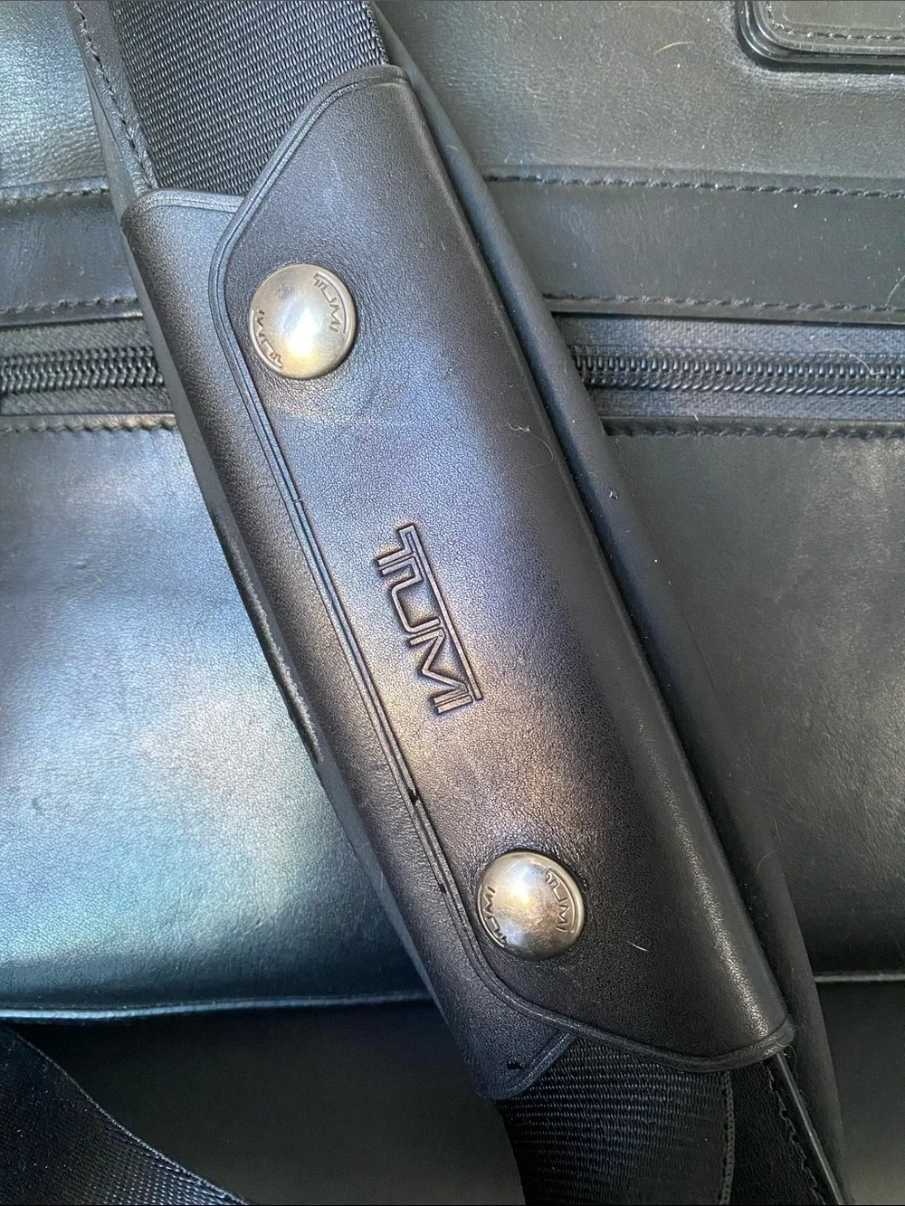 Tumi sleek leather