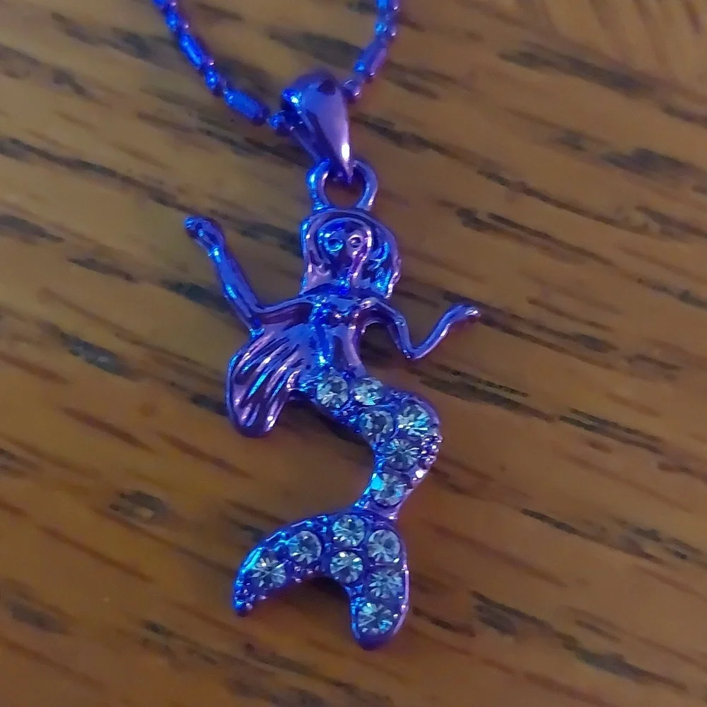 Source Unknown purple mermaid
