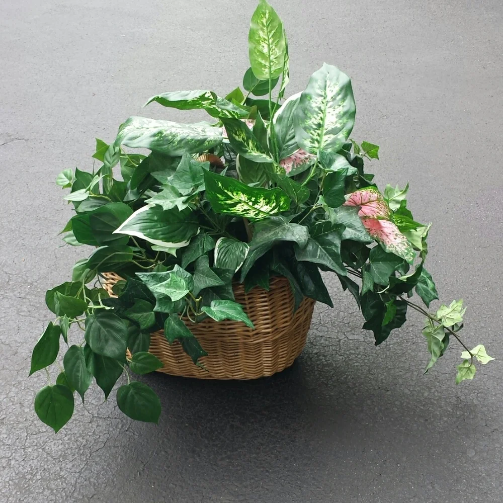 Faux plants in a wicker basket