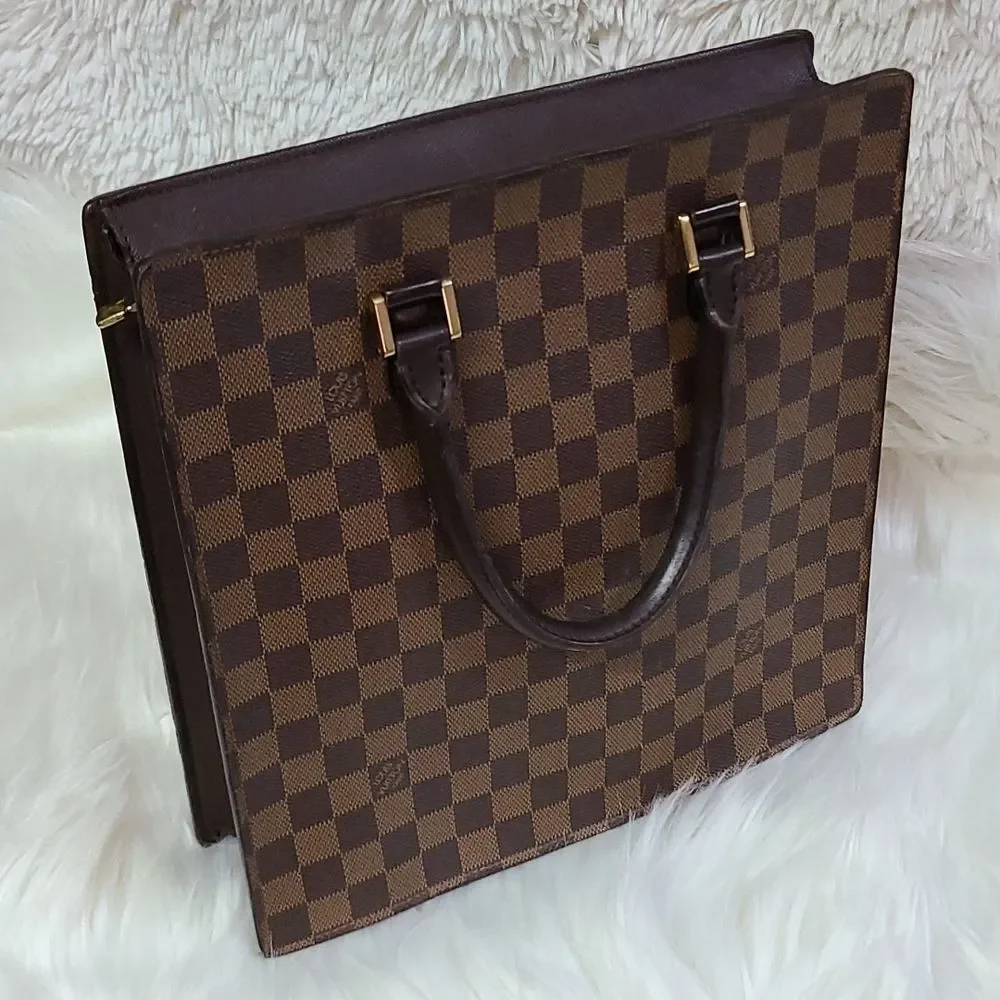 Louis Vuitton handbag it carefully