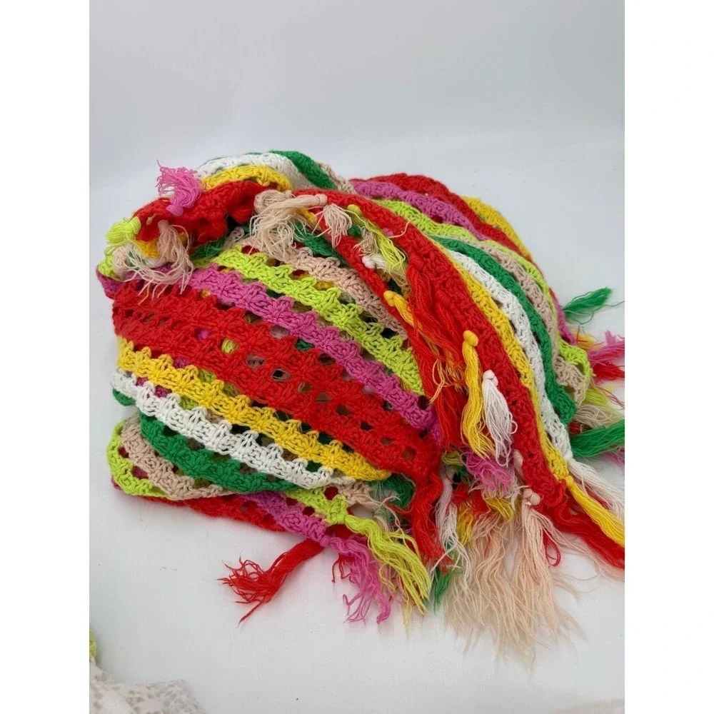 3.1.5 multicolored crochet throw blanket with a striped pattern and fringe trim