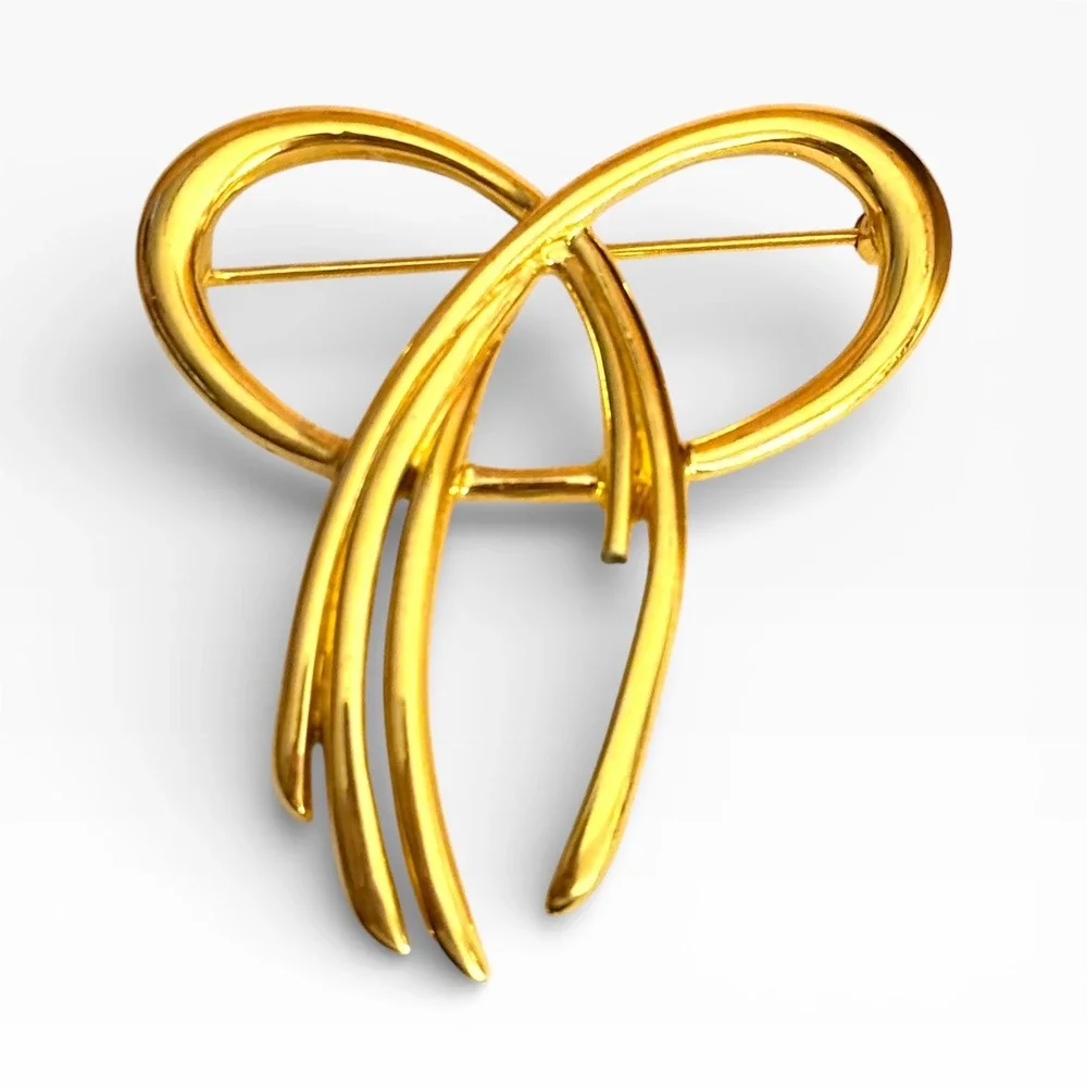 Trifari signed gold