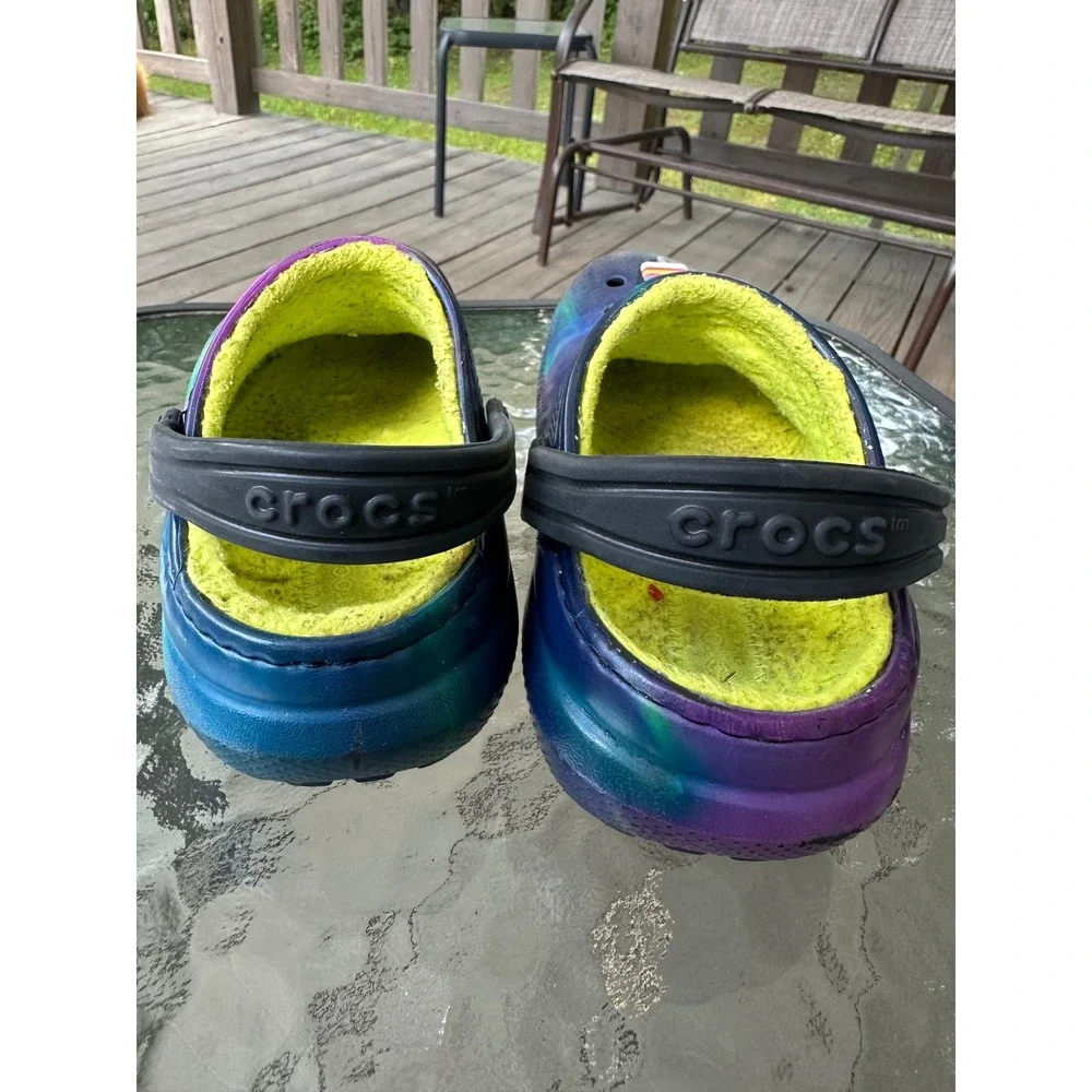 CROCS clogs featuring