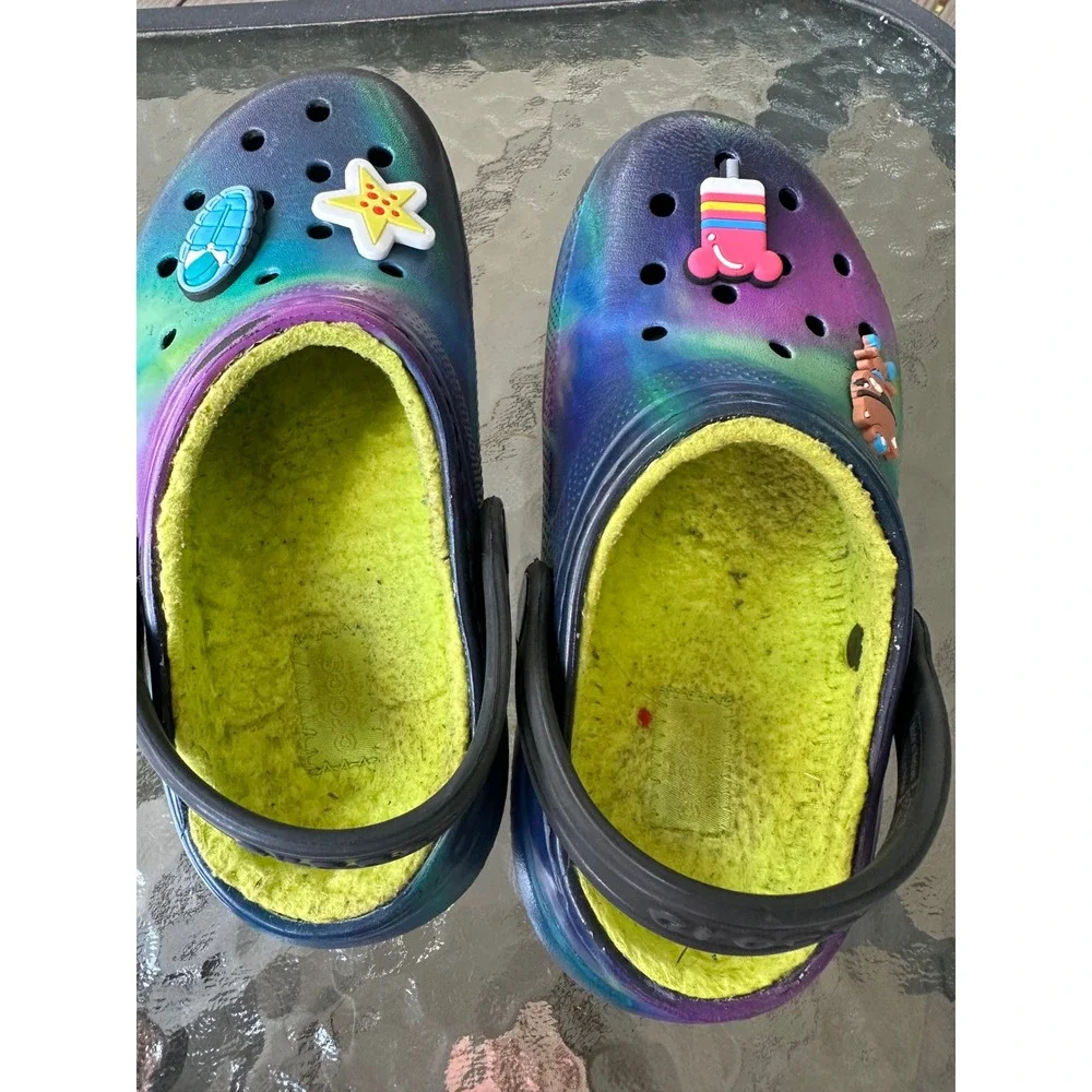CROCS clogs featuring