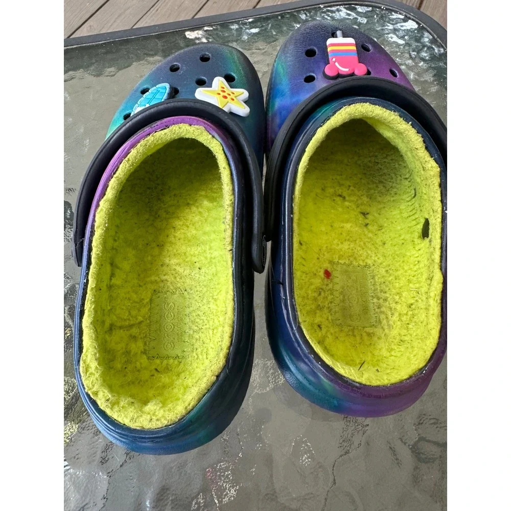 CROCS clogs featuring