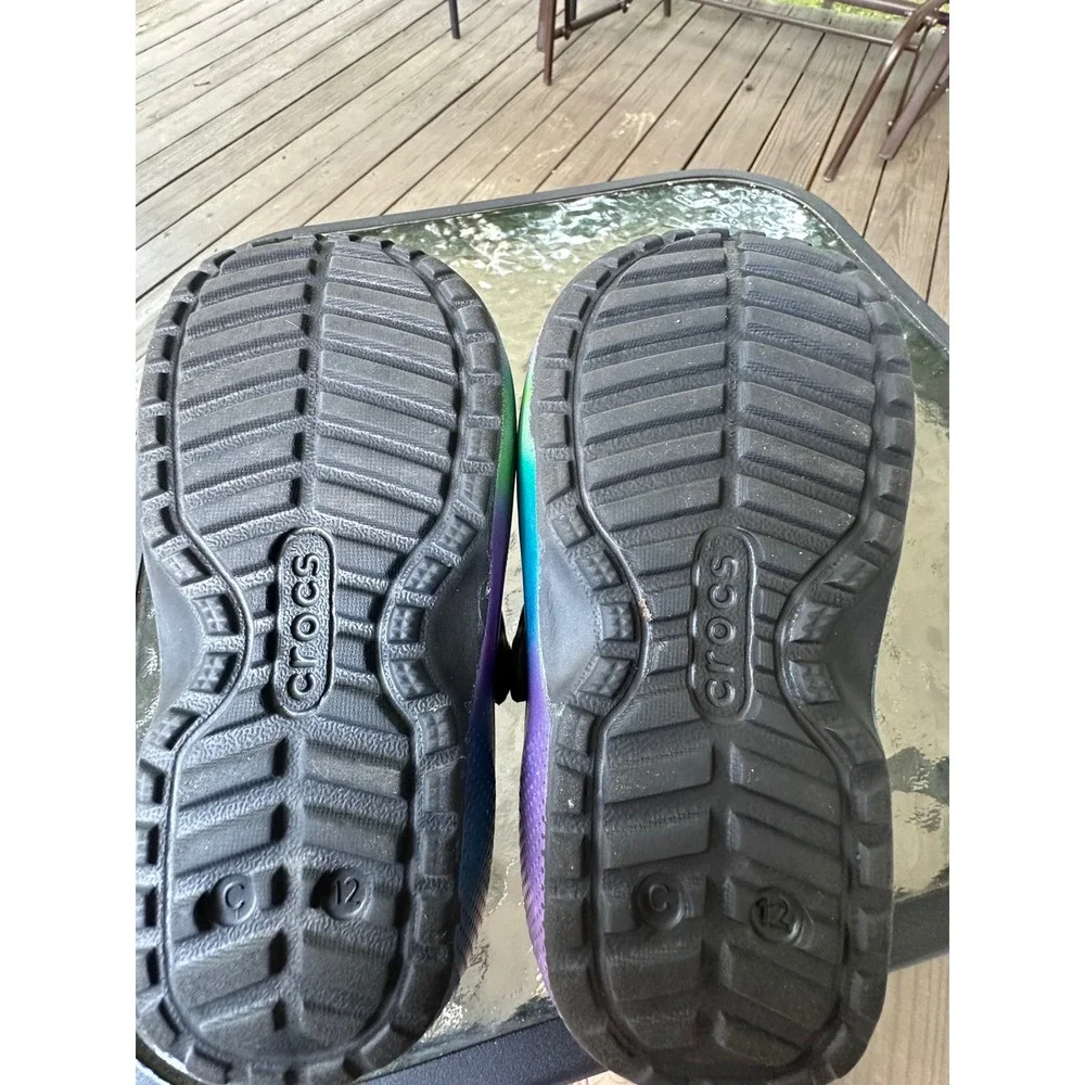 CROCS clogs featuring