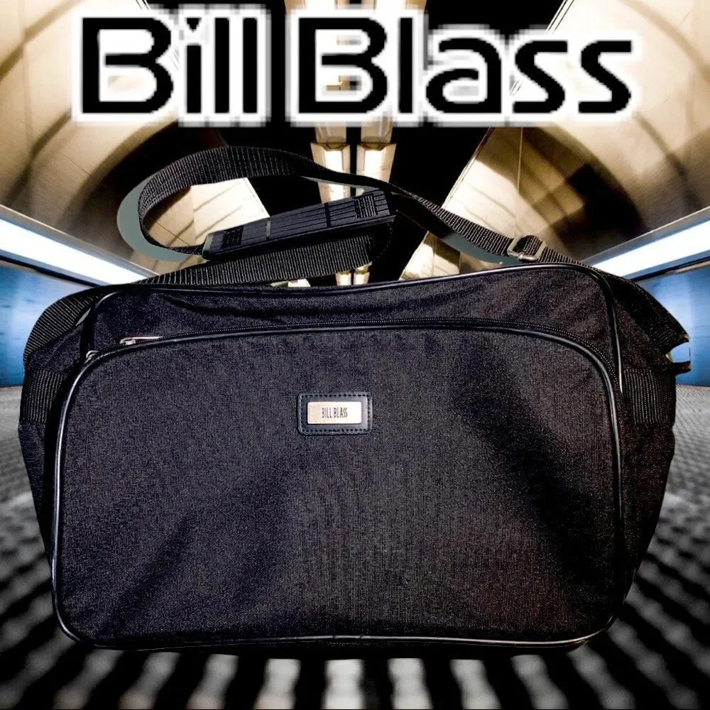 Bill Blass Small Carry On Small Luggage Bag from a larger Set.