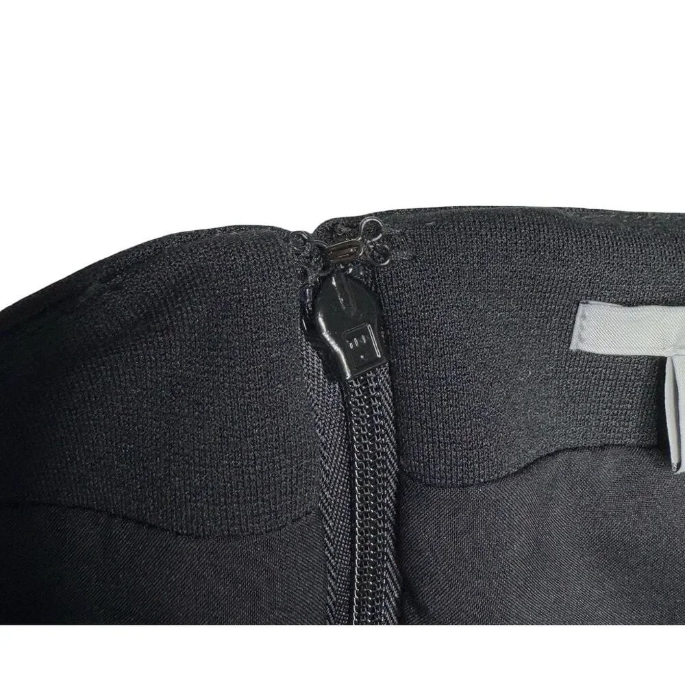 Knomo London logo cross
