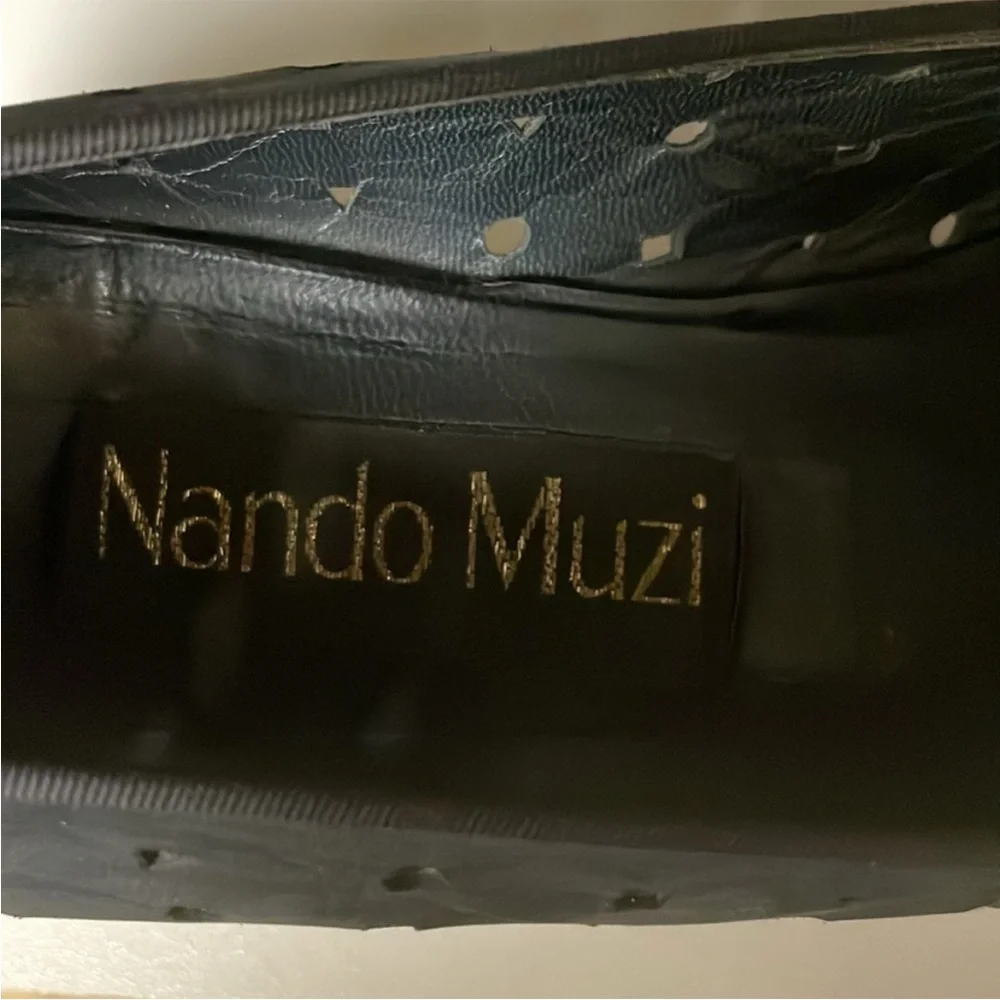 Nando Muzi both worn