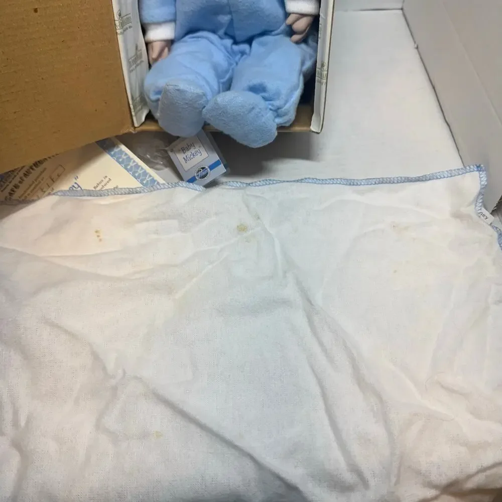 Ashton Drake preowned stains