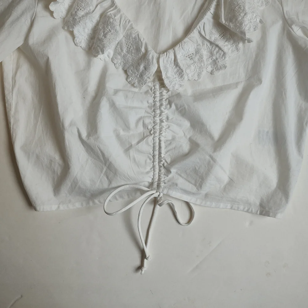 Anthropologie lightweight white