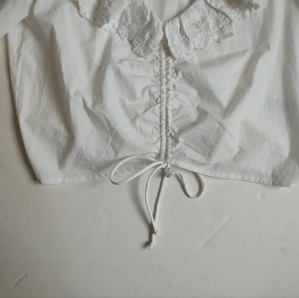 Anthropologie lightweight white