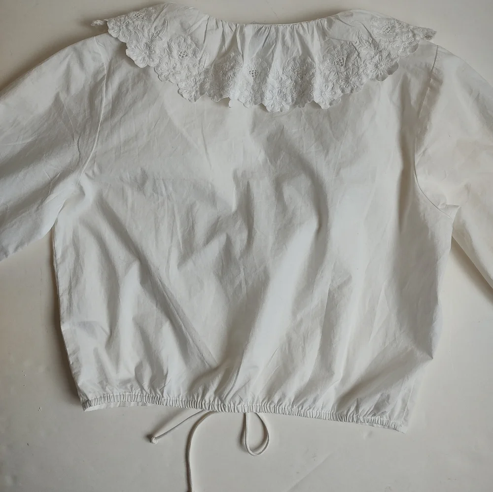 Anthropologie lightweight white