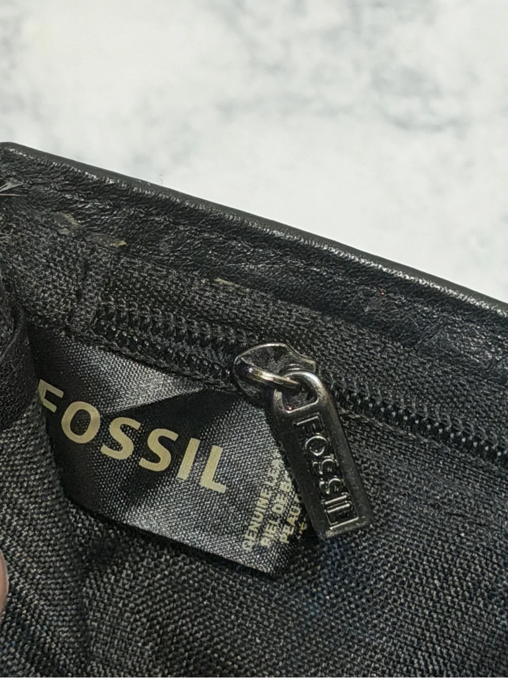 Fossil evan zip
