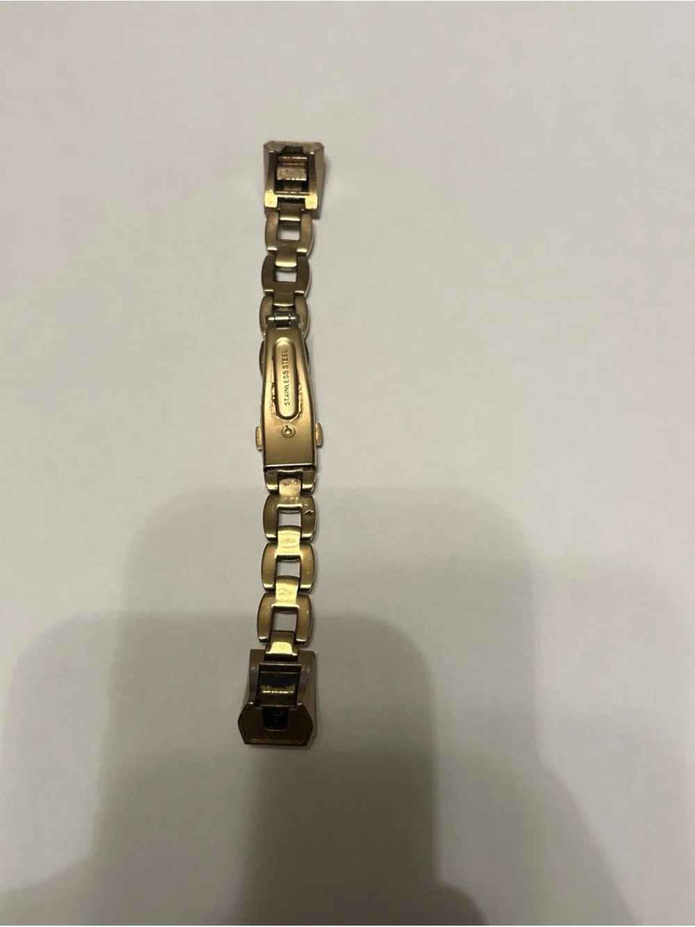fitbit tone steel gold