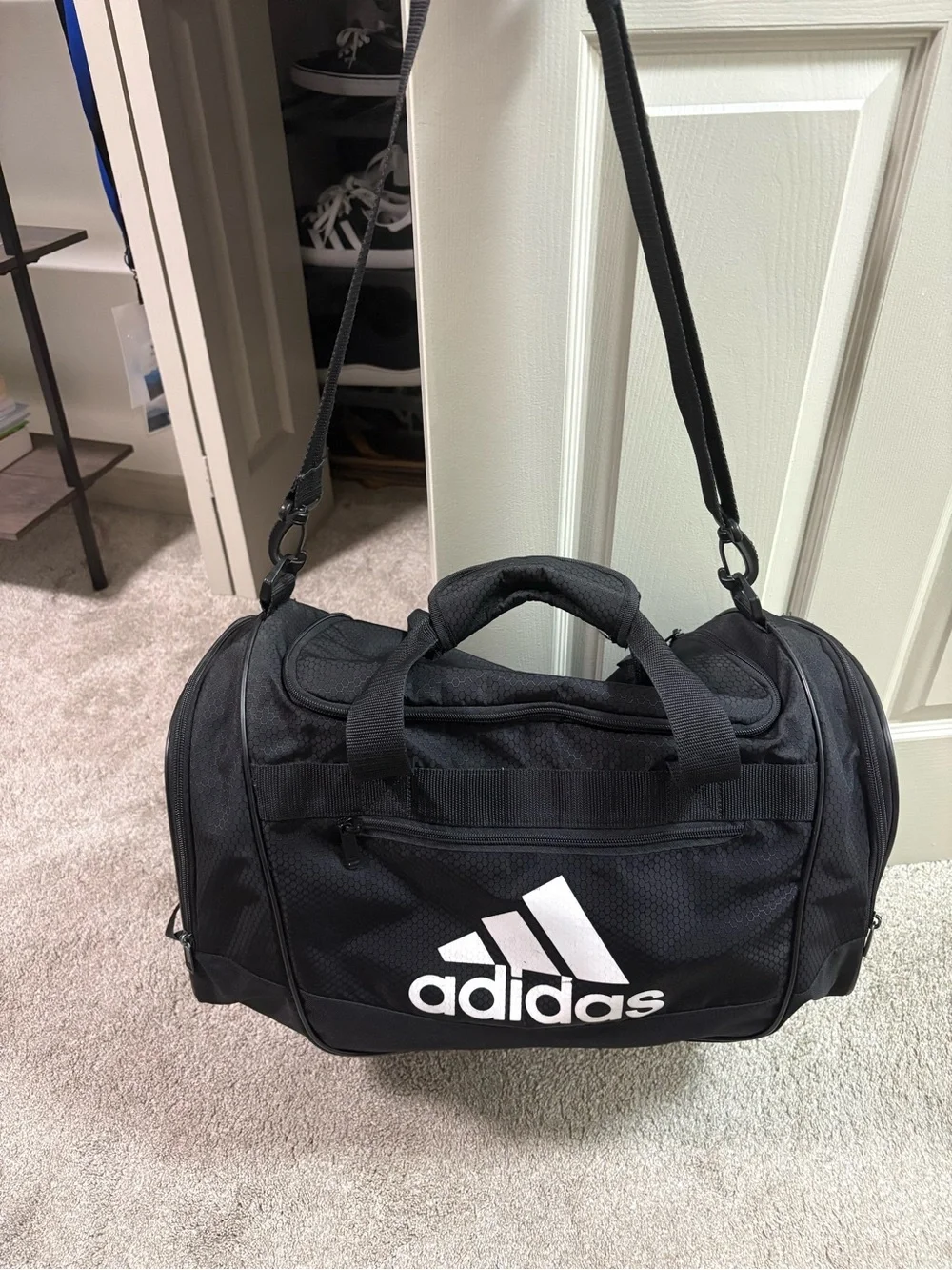 adidas Black Duffel Bag with White Logo and Shoulder Strap