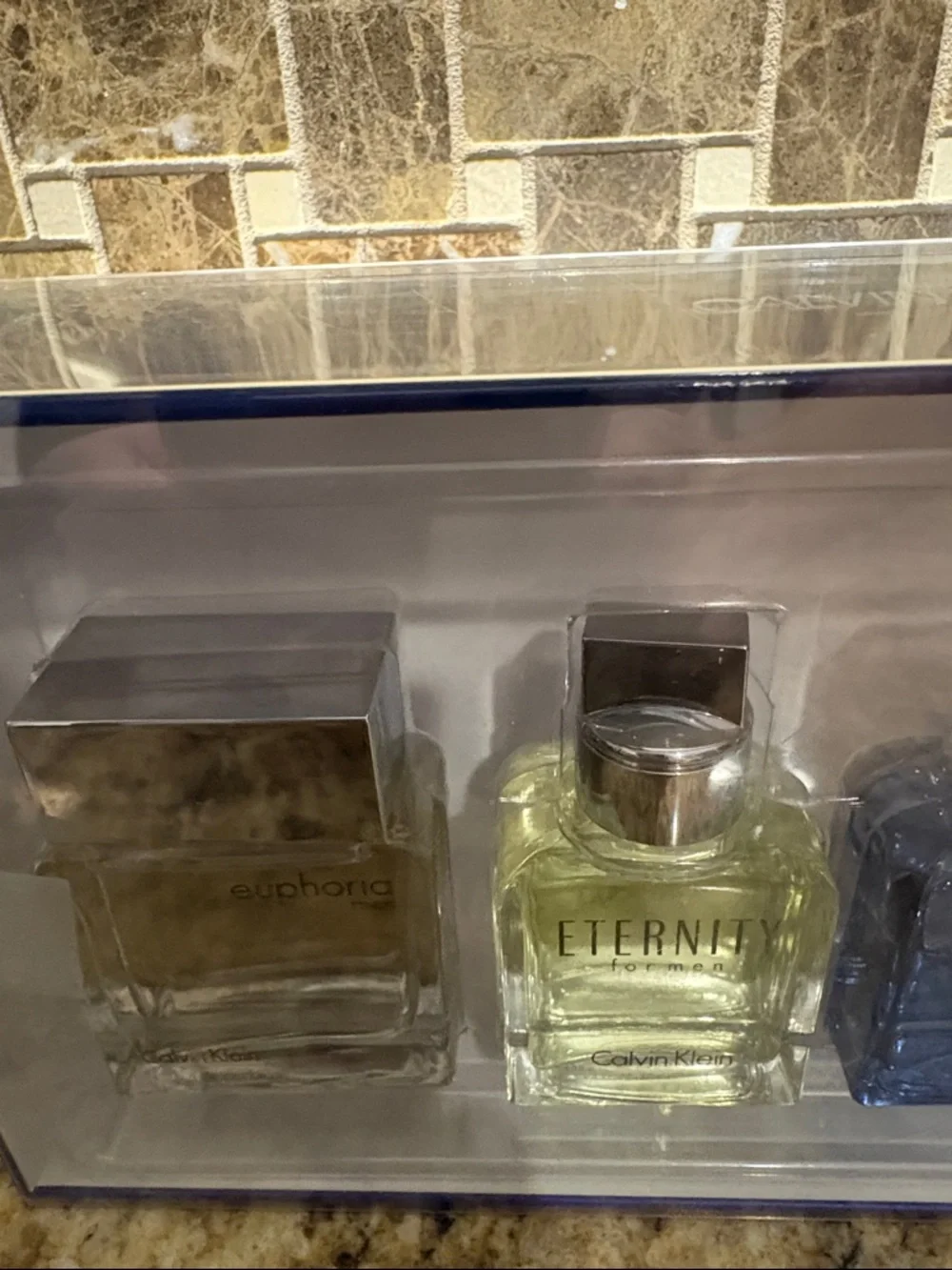 Calvin Klein Men's Mini Cologne Quartet -‎ Amber, Blue, Pale Yellow, Clear