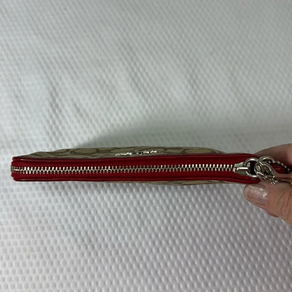 Coach tan and red Wristlet with Logo Pattern