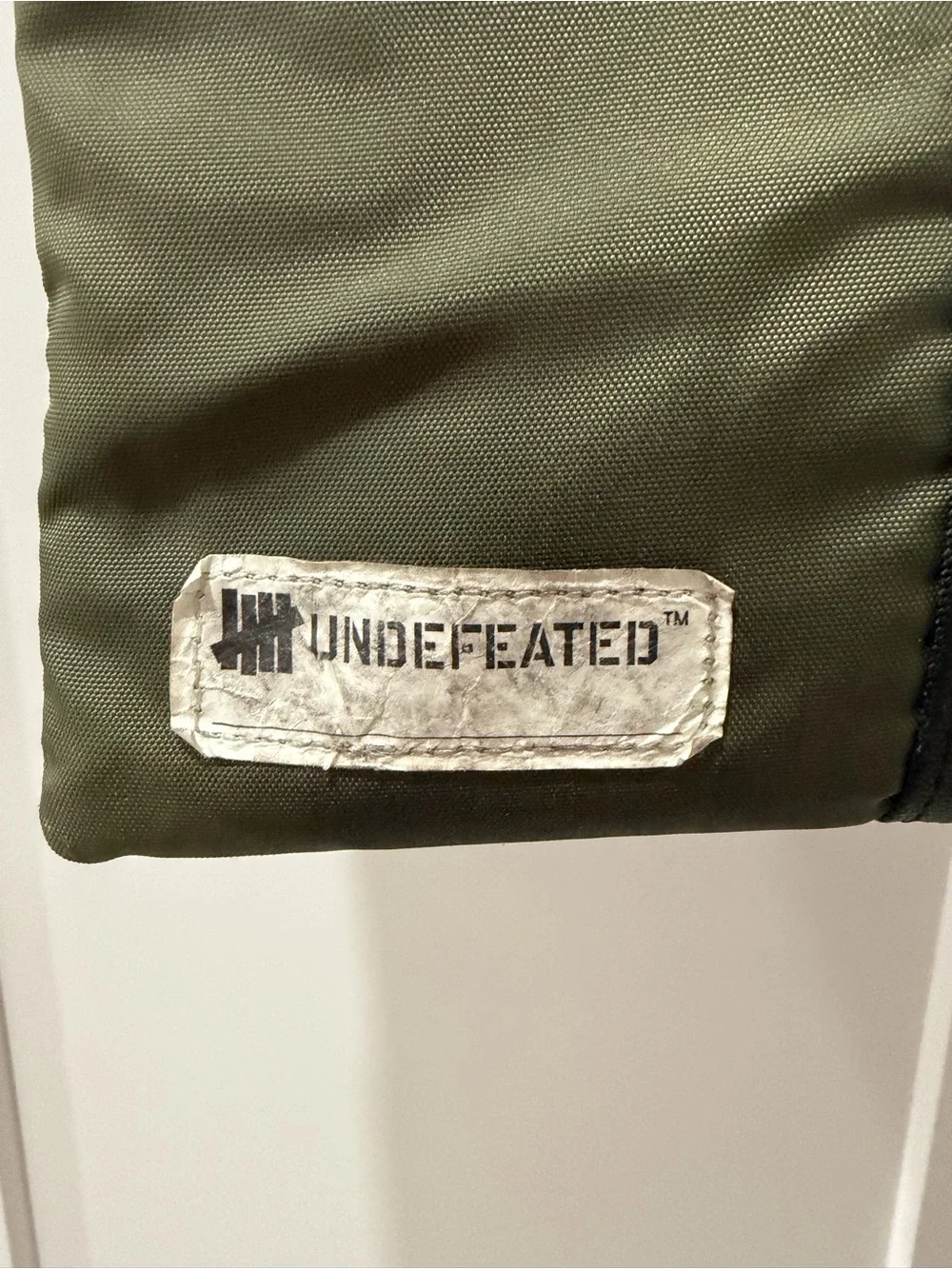 Undefeated smart clean zipper